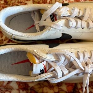 Nike Platform White Leather Athletic Sneakers with Black Swoosh